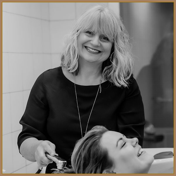 Tina is a premier hair stylists at Total Look